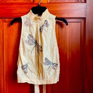 Sleeveless tie back top